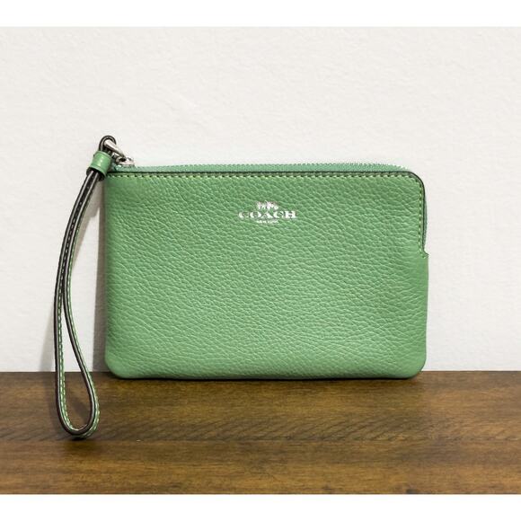 NWT: Coach - Women's Soft Green, Leather, Corner Wristlet with Silver Logo - Picture 1 of 4